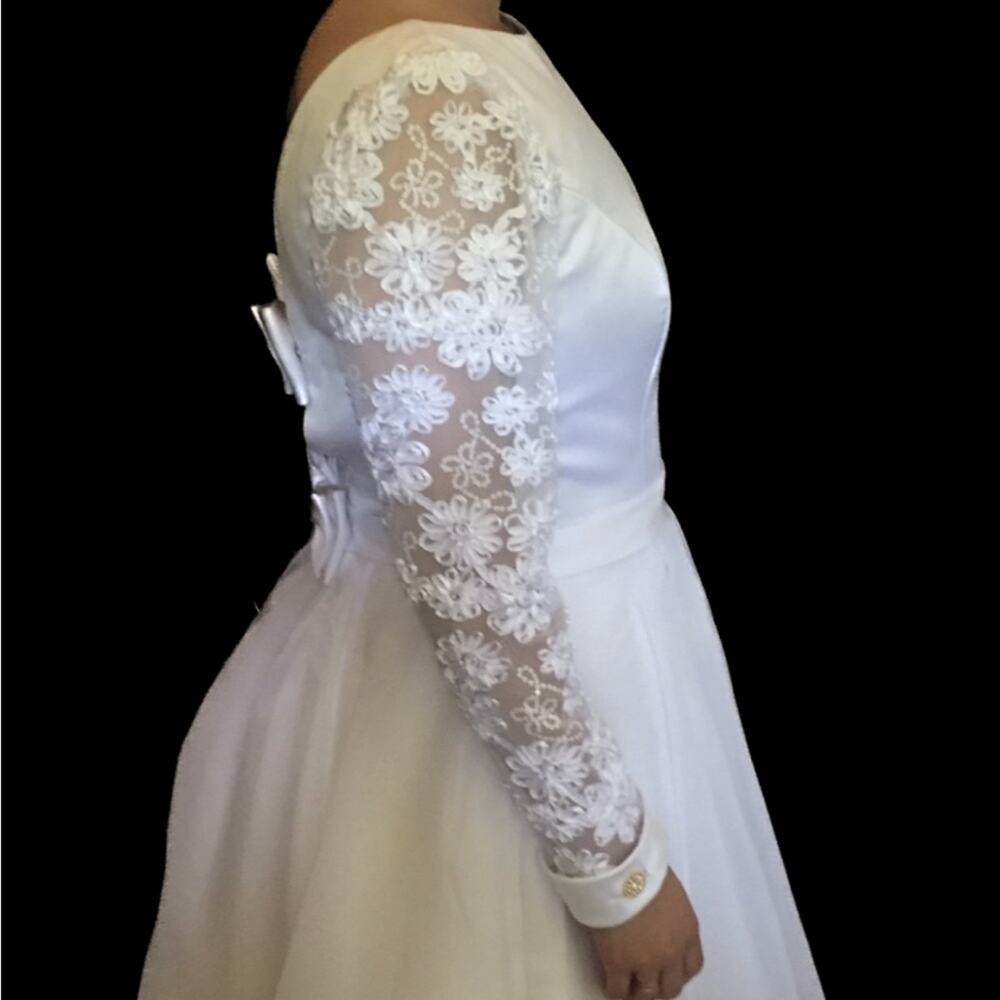 Adorable wedding communion dress twirls beautifully with sheer overlay on satin.
